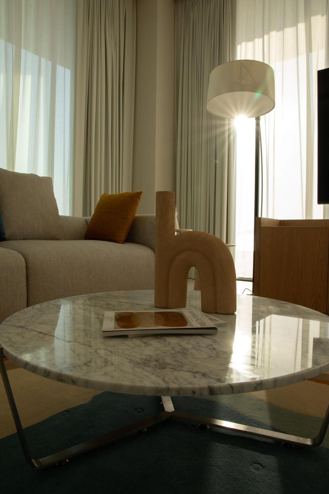 Ajman Hotel & Villas By Blazon Hotels Екстериор снимка A 3D rendering of a living room