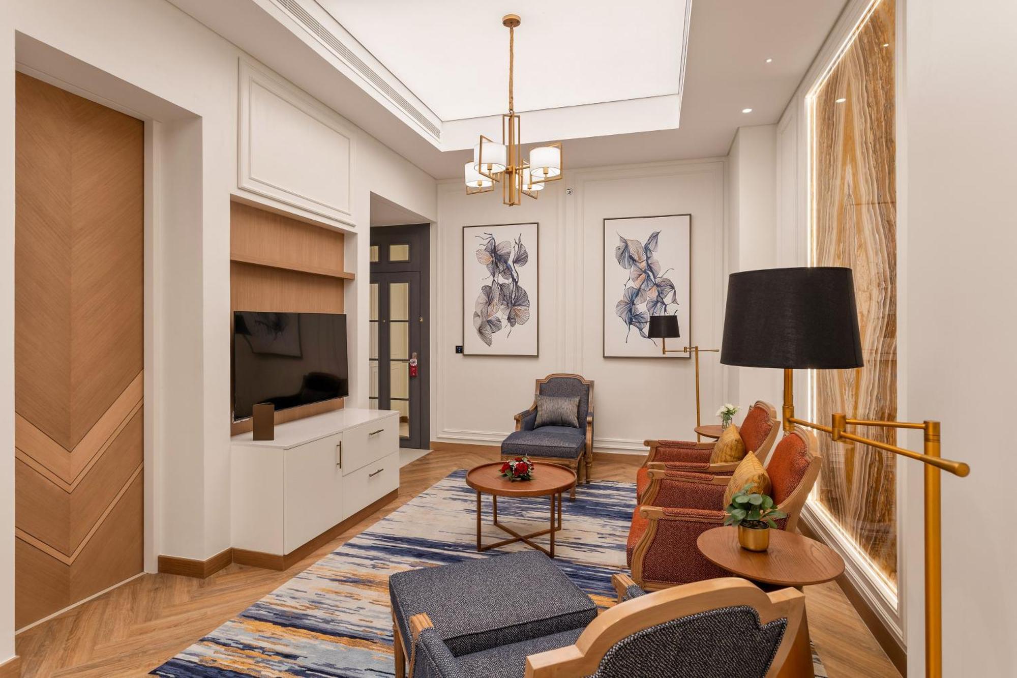 Ajman Hotel & Villas By Blazon Hotels Екстериор снимка A living room in a suite at the hotel