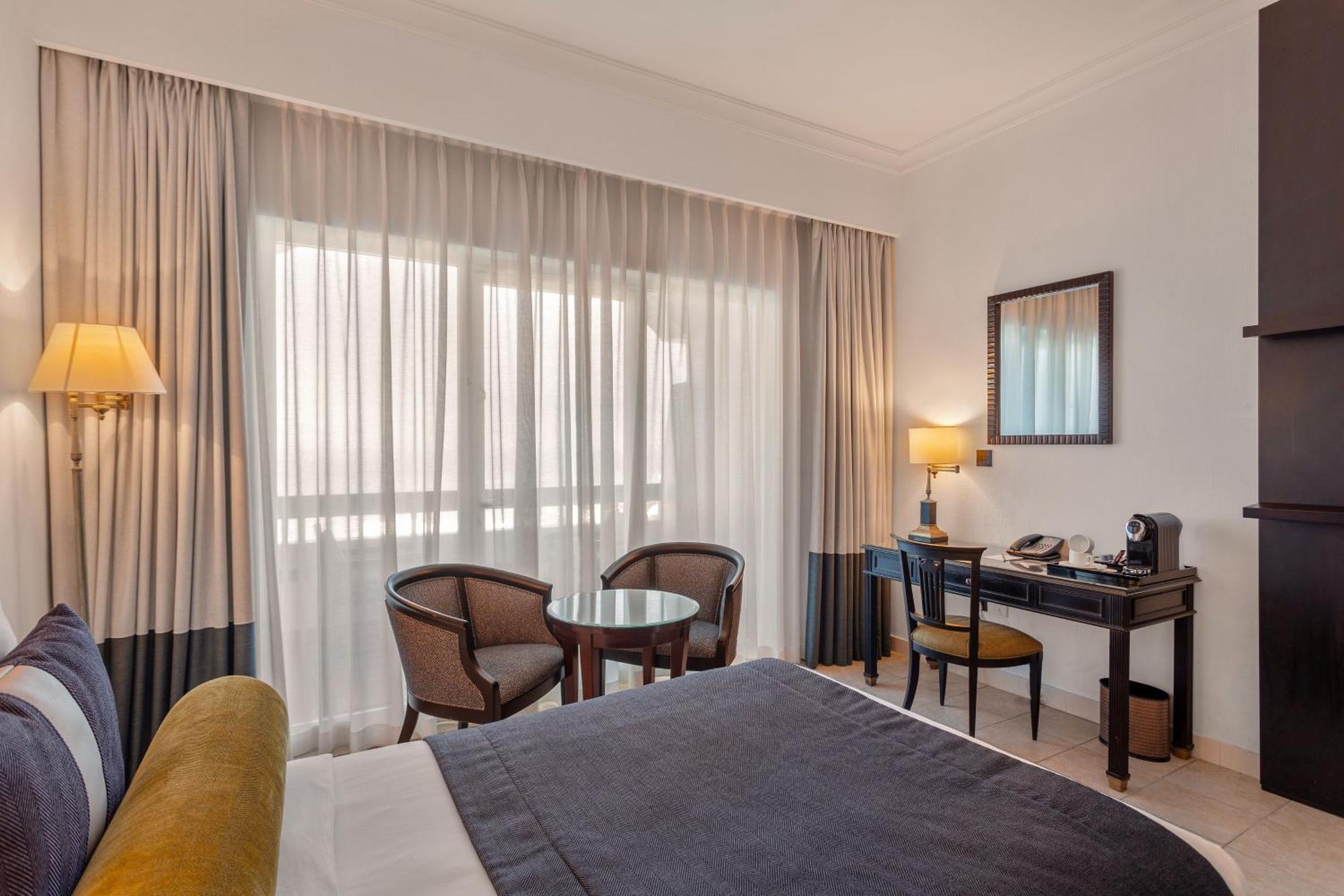 Ajman Hotel & Villas By Blazon Hotels Екстериор снимка A room at the hotel