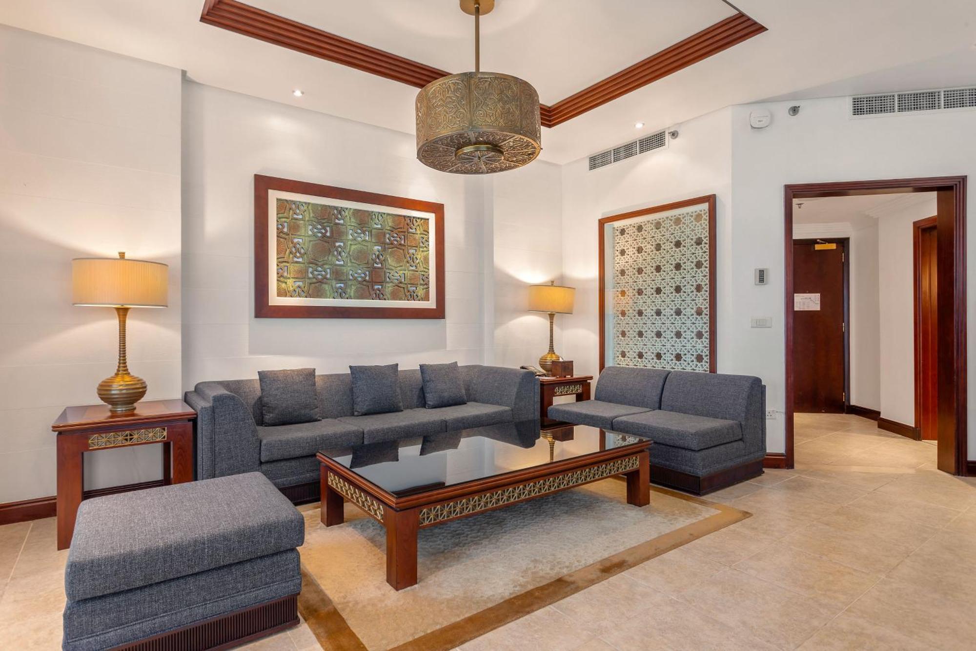 Ajman Hotel & Villas By Blazon Hotels Екстериор снимка A living room at the hotel