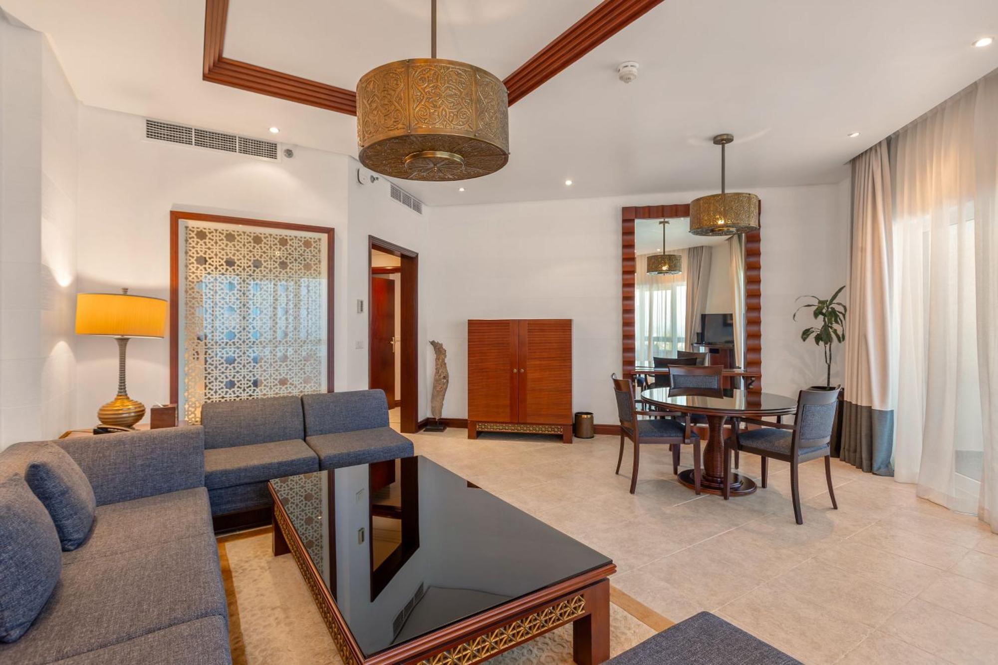 Ajman Hotel & Villas By Blazon Hotels Екстериор снимка A suite at the Ritz-Carlton, DIFC